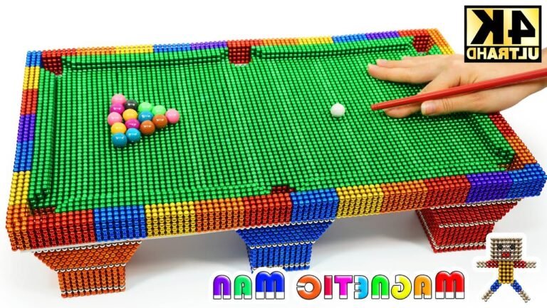 billes aimantees colorees sur une table