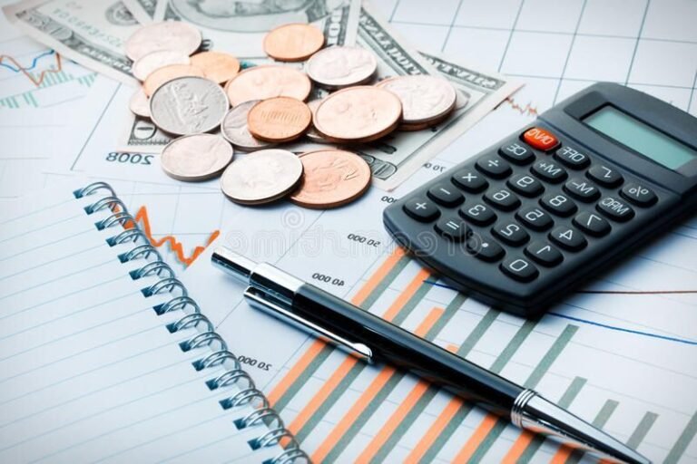 calculatrice et pieces de monnaie