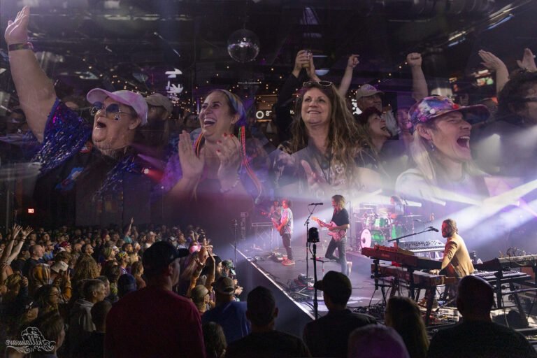 Quel est l'impact du concert hommage à Freddie Mercury sur Queen 42 concert hommage avec foule et musique vibrante